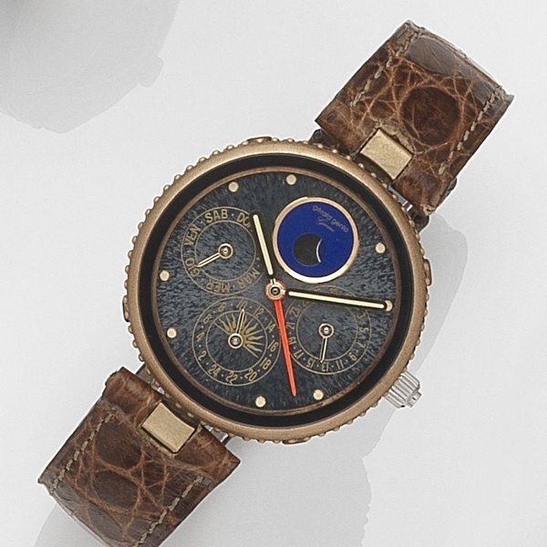 Gerald Genta. A bronze quartz triple calendar alarm wristwatch with moon phases