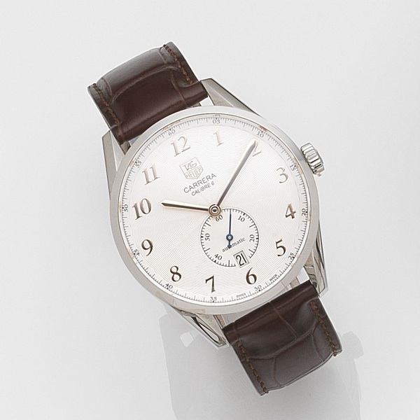TAG Heuer. A stainless steel automatic calendar wristwatch with box and papers
