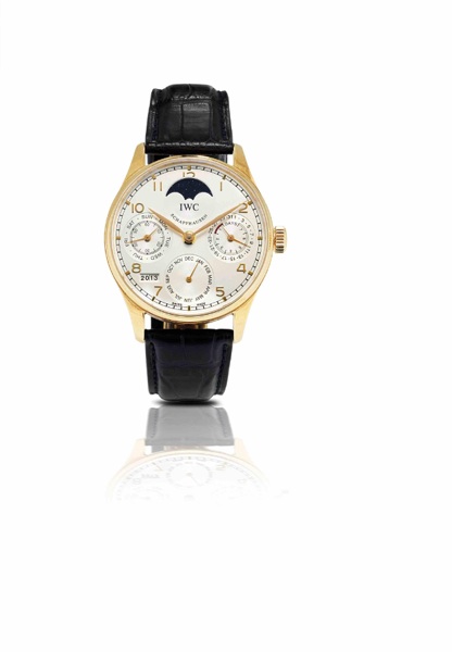 IWC. A fine and rare 18ct rose gold perpetual calendar automatic wristwatch with 7 days power reserve and moon phase
