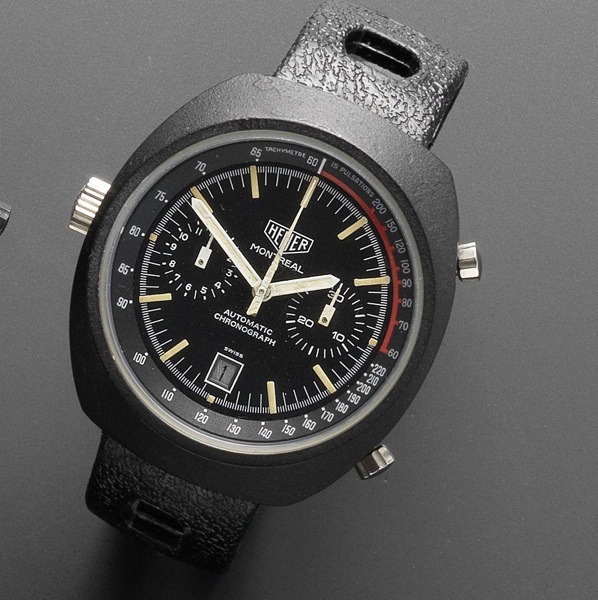 Heuer. A black PVD coated automatic calendar chronograph wristwatch