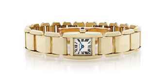 CARTIER. A LADY'S 18K GOLD SQUARE BRACELET WATCH