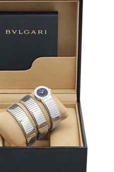 BVLGARI. A LADY'S STAINLESS STEEL BANGLE WATCH