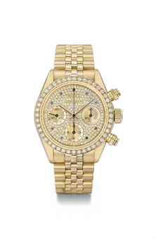 Rolex. An extremely rare and very attractive 18K gold, diamond and sapphire-set chronograph wristwatch with bracelet, original guarantee and box