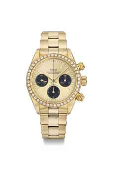 Rolex. An extremely rare and very attractive 18K gold and diamond-set chronograph wristwatch with bracelet, original guarantee and box