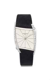 Patek Philippe. An extremely fine and rare platinum asymmetrical diamond-set wristwatch, designed by Gilbert Albert