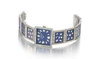 Patek Philippe. A lady's very rare, attractive and unusual square 18K white gold bracelet with blue dial and fragmented mirror-like pieces on the dial and bracelet links