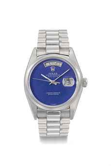 Rolex. A rare and very attractive platinum automatic calendar wristwatch with sweep centre seconds, bracelet and lapis lazuli dial