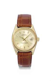 Rolex. An attractive and rare 18K gold automatic wristwatch with sweep centre seconds, date and bark-finish bezel