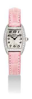 FRANCK MULLER. A LADY'S 18K WHITE GOLD AND DIAMOND-SET TONNEAU-SHAPED WRISTWATCH