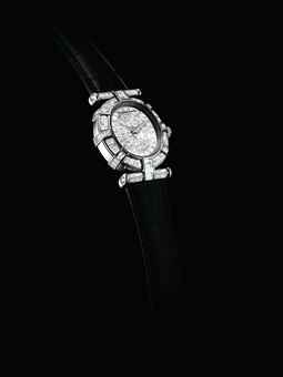 VACHERON CONSTANTIN. A LADY'S IMPRESSIVE AND VERY FINE 18K WHITE GOLD DIAMOND-SET OVAL WRISTWATCH
