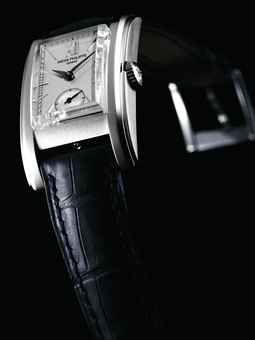 PATEK PHILIPPE. A FINE AND RARE PLATINUM LIMITED EDITION RECTANGULAR WRISTWATCH WITH ORIGINAL CERTIFICATE AND BOX, MADE TO COMMEMORATE THE REOPENING OF THE PATEK PHILIPPE BOUTIQUE IN GENEVA IN 2006
