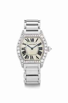 Cartier. A Lady's Fine 18k White Gold and Diamond-Set Wristwatch with Bracelet