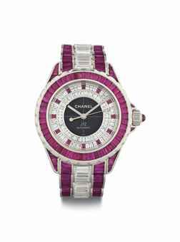 Chanel. A Rare 18k White Gold and Ceramic Limited Edition Automatic Wristwatch Set with Diamonds and Rubies