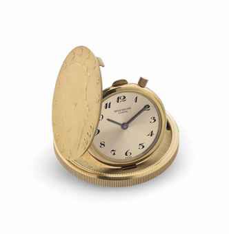 Patek Philippe. A Rare 18k Gold United States of America Twenty Dollar Coin Watch with Champagne Dial and Breguet Numerals