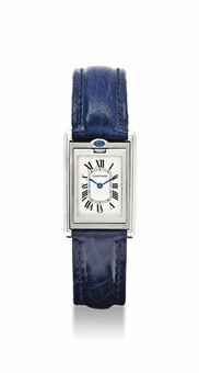 CARTIER. AN UNUSUAL STAINLESS STEEL AND SAPPHIRE-SET RECTANGULAR REVERSIBLE WRISTWATCH