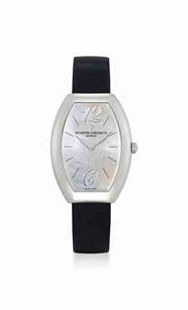 VACHERON CONSTANTIN. A LADY'S FINE 18K WHITE GOLD TONNEAU-SHAPED WRISTWATCH WITH MOTHER-OF-PEARL DIAL