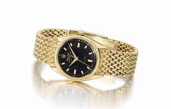 Rolex. An attractive and rare 18k gold automatic wristwatch with sweep centre seconds and woven bracelet