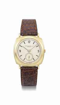 Patek Philippe. An 18K gold self-winding cushion-shaped wristwatch