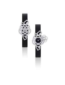 CHANEL. A LADY'S FINE AND ELEGANT 18K WHITE GOLD AND DIAMOND-SET WRISTWATCH WITH CONCEALED DIAL