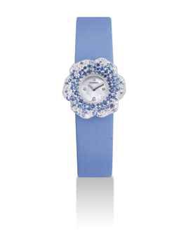 CHANEL. A LADY'S FINE 18K WHITE GOLD, SAPPHIRE AND DIAMOND-SET CAMELLIA-SHAPED WRISTWATCH WITH MOTHER-OF-PEARL DIAL