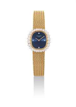 PATEK PHILIPPE. A LADY'S FINE 18K GOLD AND DIAMOND-SET OVAL BRACELET WATCH