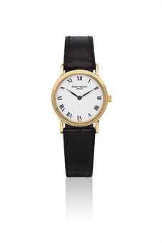 PATEK PHILIPPE. A LADY'S 18K GOLD WRISTWATCH