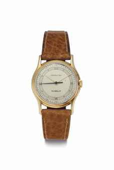 Patek Philippe. A Fine 18k Gold Wristwatch with Two-Tone Silvered Dial