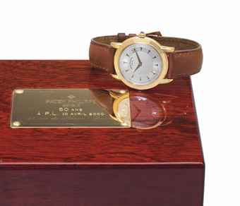Patek Philippe. A Fine 18k Gold Limited Edition Automatic Wristwatch Made to Celebrate the Millennium
