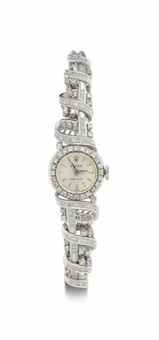 Rolex. A Lady's Fine 18k White Gold and Diamond-Set Bracelet Watch