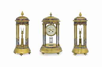 Japy. A Fine Three Piece Lacquered Brass and Champlevé Enamel Striking Clock Garniture