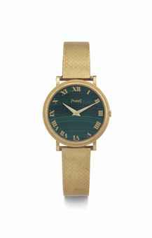 Piaget. A Lady's 18k Gold Wristwatch with Malachite Dial and Bracelet