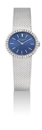 PATEK PHILIPPE. A LADY'S 18K WHITE GOLD AND DIAMOND-SET OVAL BRACELET WATCH