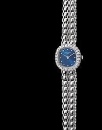 PATEK PHILIPPE. A LADY'S FINE 18K WHITE GOLD AND DIAMOND-SET CUSHION-SHAPED BRACELET WATCH