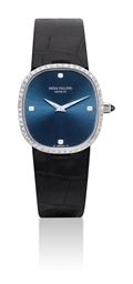 PATEK PHILIPPE. A LADY'S 18K WHITE GOLD AND DIAMOND-SET CUSHION-SHAPED WRISTWATCH