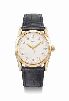 Rolex. A fine and rare 14K gold wristwatch with sweep centre seconds