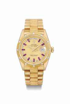 Rolex. A rare and attractive 18K gold, diamond and ruby-set calendar wristwatch with sweep centre seconds and bracelet