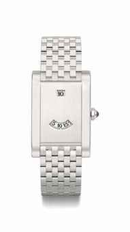 Cartier. A fine and rare platinum limited edition jump hour wristwatch with bracelet