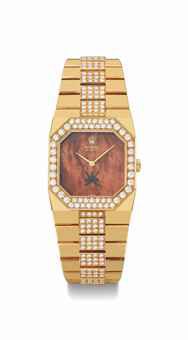 Rolex. A rare 18K gold and diamond-set rectangular bracelet watch with mahogany dial, made for the Sultanate of Oman