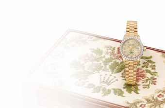 Rolex. A very fine, rare and elegant 18K gold and diamond-set automatic wristwatch with sweep centre seconds, date, bracelet and box, made for the Sultanate of Oman