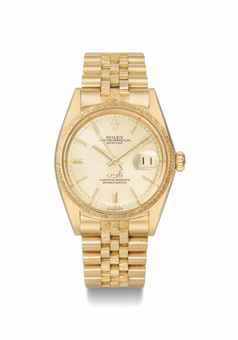 Rolex. An attractive and rare 18K gold automatic wristwatch with date, bark-finish bezel and bracelet, made for the Sultanate of Oman