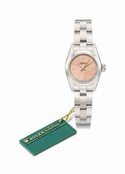 Rolex. A possibly unique stainless steel automatic wristwatch with pink dial erroneously displaying 6-6-9 hour markers, sweep centre seconds, bracelet and original guarantee