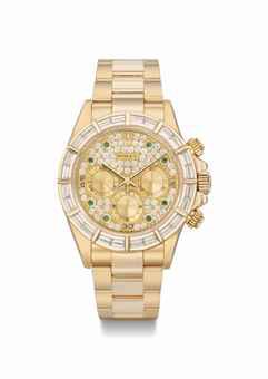 Rolex. A very rare and impressive 18K gold diamond and emerald-set automatic chronograph wristwatch with bracelet