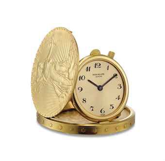 PATEK PHILIPPE. A FINE AND RARE 18K GOLD TWENTY DOLLAR COIN WATCH