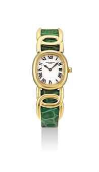 PATEK PHILIPPE. A LADY'S RARE 18K GOLD CUSHION-SHAPED WRISTWATCH WITH EXTENDED LUGS