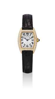 FRANCK MULLER. A LADY'S 18K GOLD AND DIAMOND-SET TONNEAU-SHAPED WRISTWATCH