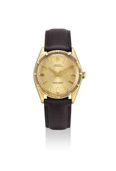 ROLEX. A FINE 14K GOLD AUTOMATIC WRISTWATCH WITH SWEEP CENTRE SECONDS