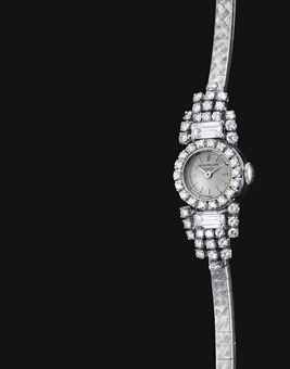 PATEK PHILIPPE. A LADY'S FINE 18K WHITE GOLD AND DIAMOND-SET WRISTWATCH