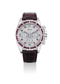 ROLEX. A FINE AND RARE 18K WHITE GOLD, DIAMOND AND RUBY-SET CHRONOGRAPH WRISTWATCH
