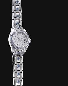 ROLEX. A LADY'S FINE AND RARE 18K WHITE GOLD, DIAMOND AND SAPPHIRE-SET AUTOMATIC WRISTWATCH WITH SWEEP CENTRE SECONDS, DATE AND BRACELET