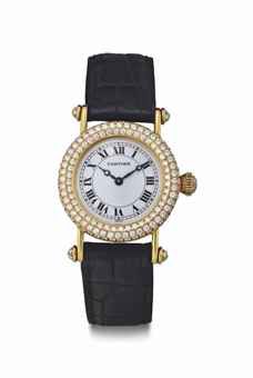 Cartier. A Lady's 18k Gold and Diamond-Set Wristwatch